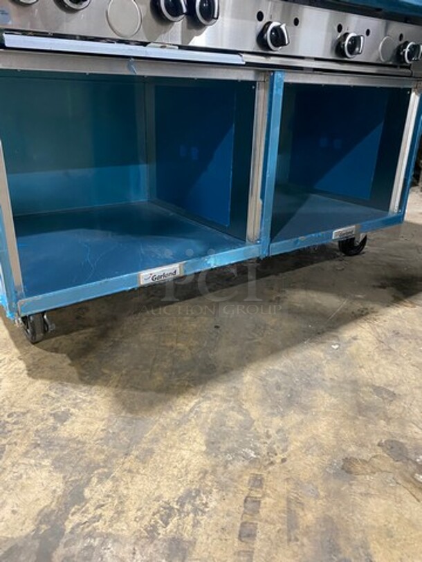 WOW! NEVER USED! Garland Commercial Natural Gas Powered 4 Burner Stove With Right Side Flat Griddle! Griddle Has Back And Side Splashes! With 2 Compartment Storage Space Underneath! All Stainless Steel! On Casters! Model: G604G36SS SN: 1712100102342 - Image 9 of 12