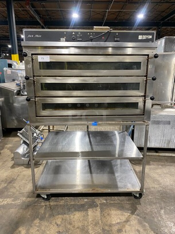 WOW! 2012 Doyon Commercial Natural Gas Powered Tripple Deck Pizza/ Baking Oven! With Shelf Storage Underneath! All Stainless Steel! On Casters! Model: PIZ6G SN: 282200000112