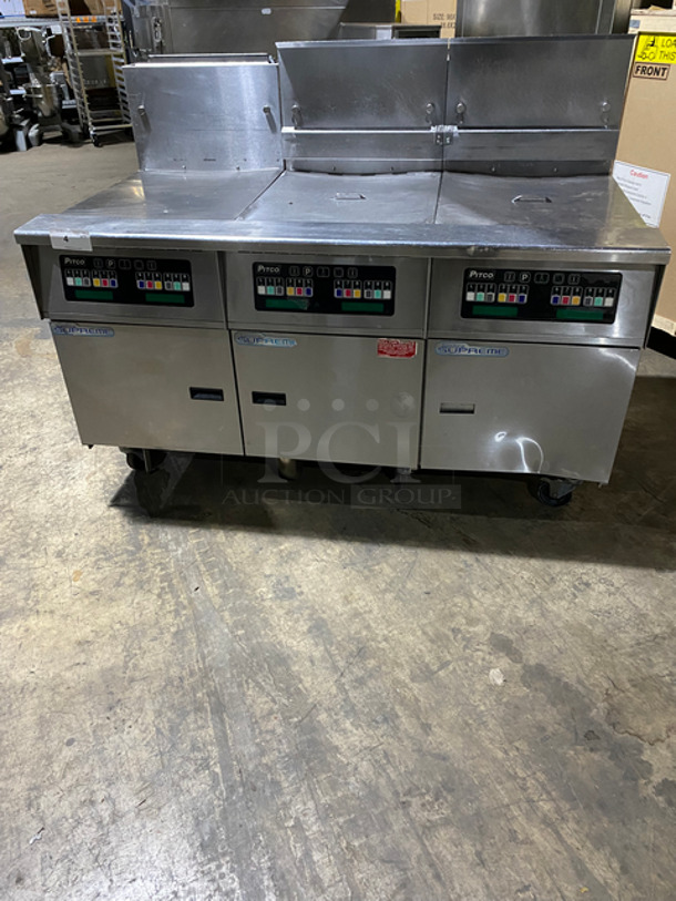 SWEET! Pitco Frialator Commercial Natural Gas Powered 3 Bay Deep Fat Fryer! With Backsplash! With Fryer Covers! All Stainless Steel! On Casters! Working When Removed! Model: SSH60W SN: G13LC064141 115V 50/60HZ