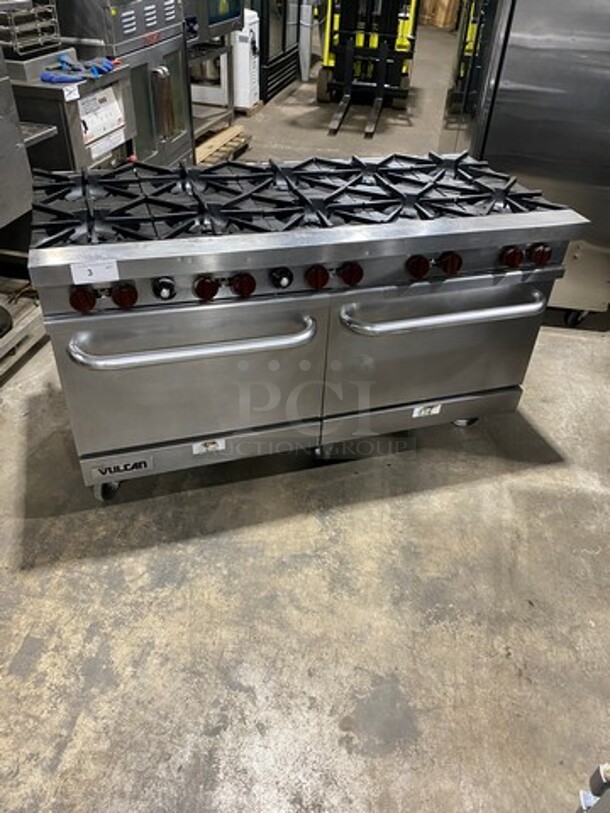 NICE! Vulcan Commerical Natural Gas Powered 10 Burner Stove! With 2 Oven Underneath! All Stainless Steel! On Casters! Working When Removed! - Image 1 of 10