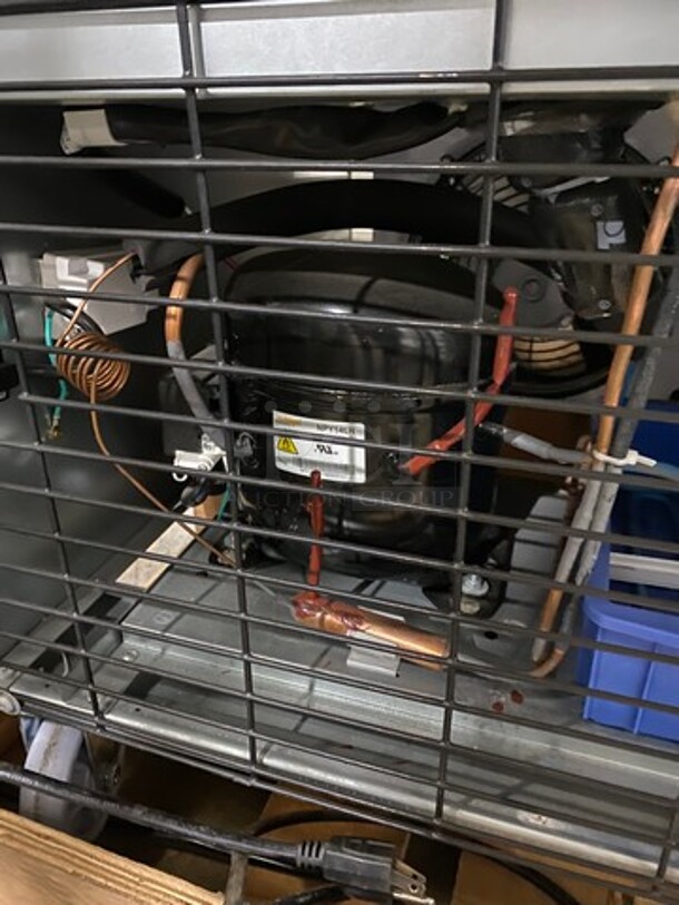 SWEET! NEW! SCRATCH-N-DENT! Dukers Commercial Single Door Reach In Freezer! Poly Coated Racks! All Stainless Steel! On Casters! POWERS ON, DOES NOT GO DOWN TO TEMPETURE! Model: D28F SN: 1097000DUK210722210800716 115V - Image 9 of 10