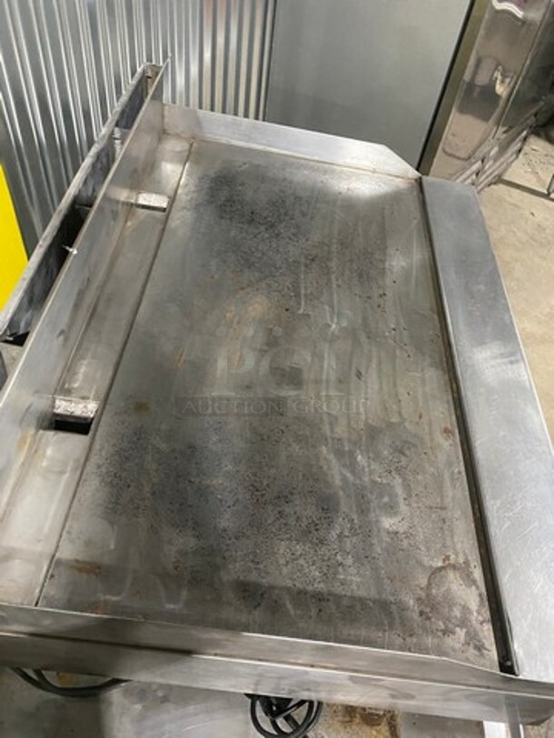 Garland Commercial Countertop Gas Powered Flat Griddle! With Back And Side Splashes! On Equipment Stand! With Storage Space Underneath! All Stainless Steel! On Casters! - Image 5 of 10