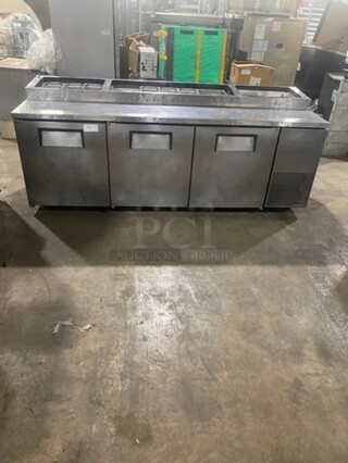 True Refrigerated Pizza Prep Table! With 3 Door Refrigerated Underneath Storage Space! All Stainless Steel! Model TPP93 Serial 6949372! 115V 1 Phase!