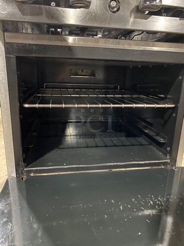 American Range Commercial Natural Gas Powered 4 Burner Stove! With Raised Back Splash And Salamander Shelf! With Oven Underneath! All Stainless Steel! On Legs! - Image 7 of 9