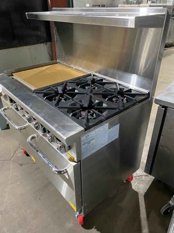 AWESOME! NEW! Migali Commercial Natural Gas Powered 4 Burner Stove With Flat Griddle! Flat Griddle Has Side Splashes! With Raised Back Splash And Salamander Shelf! With 2 Oven Underneath! Metal Oven Racks! All Stainless Steel! On Casters! Model: CRO424GLNG SN: NGUSB100321071000920017 - Image 2 of 12