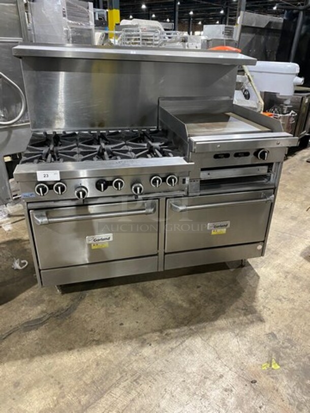 BEAUTIFUL! Garland Commercial Natural Gas Powered 6 Burner Stove With Right Side Flat Griddle! Griddle Has Side Splashes! With Raised Back Splash And Salamander Shelf! With 2 Oven Underneath! ONE OVEN WITH CONVECTION!  Metal Oven Racks! All Stainless Steel! On Legs!