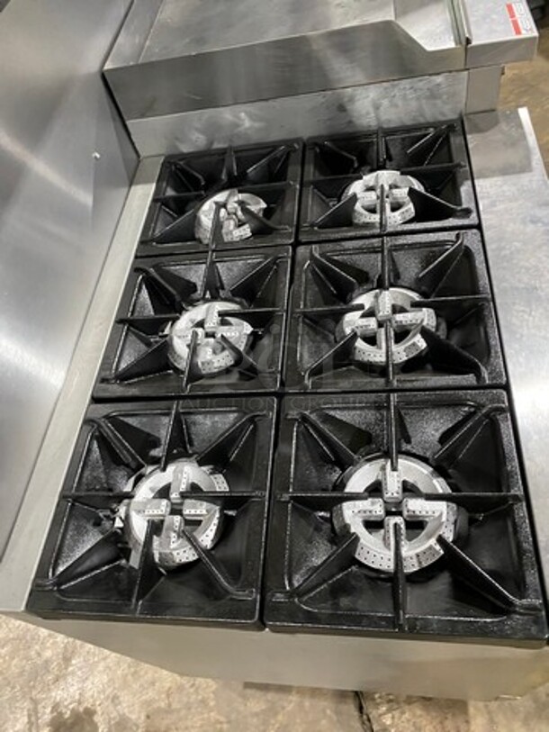 FAB! CPG Commercial Natural Gas Powered 6 Burner Stove With Right Side Flat Griddle And Cheese Melter Combo! Griddle Has Side Splashes! With Raised Back Splash And Salamander Shelf! With 2 Oven Underneath! Metal Oven Racks! All Stainless Steel! On Casters! SN: 01210402 - Image 5 of 12