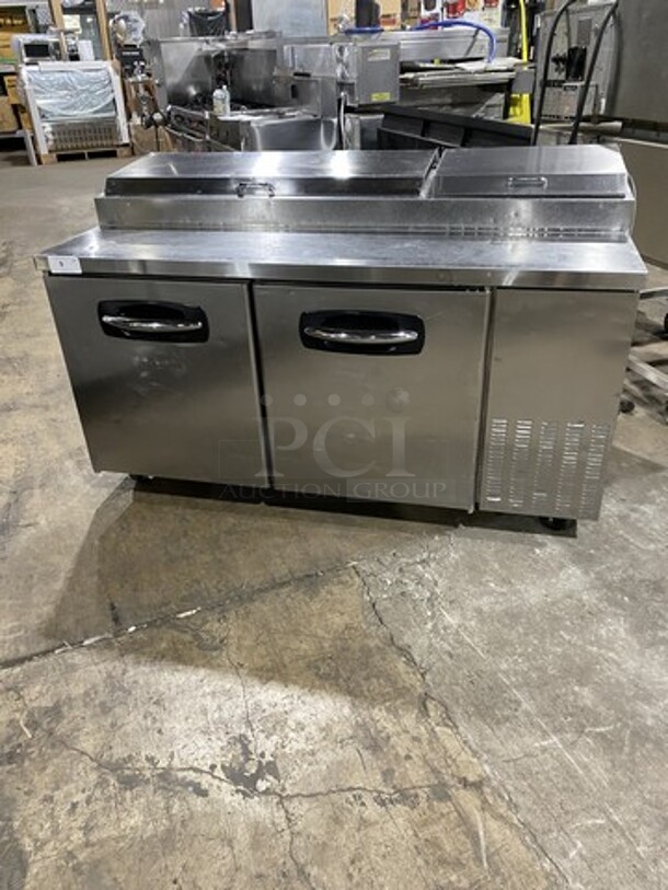 Commercial 67 Inch Refrigerated Pizza Prep Table! With 2 Door Storage Space Underneath! Poly Coated Racks! All Stainless Steel! On Casters! Model: PT67 SN: 11100035 115V 60HZ 1 Phase