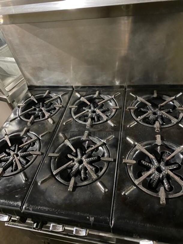 Garland Commercial Natural Gas Powered 6 Burner Stove! With Raised Back Splash And Salamander Shelf! With Oven Underneath! All Stainless Steel! On Casters! WORKING WHEN REMOVED! - Image 5 of 10