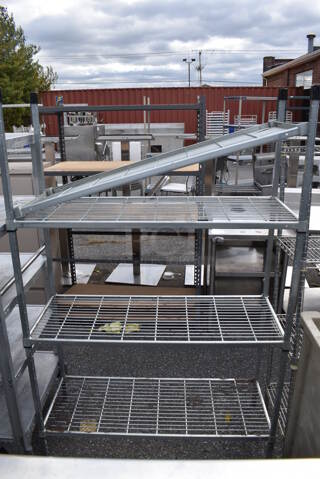 Gray Finish 4 Tier Wire Shelving Unit. BUYER MUST DISMANTLE. PCI CANNOT DISMANTLE FOR SHIPPING. PLEASE CONSIDER FREIGHT CHARGES. 48x18x72