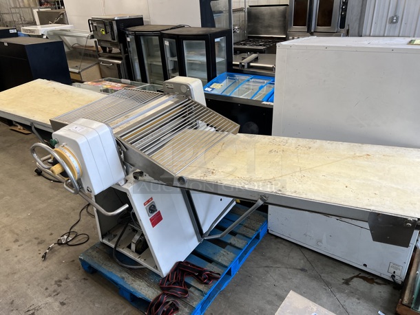 Seewer Rondo SSO 67 Metal Commercial Floor Style Reversible Dough Sheeter on Commercial Casters. 208-250 Volts. 130x48x45