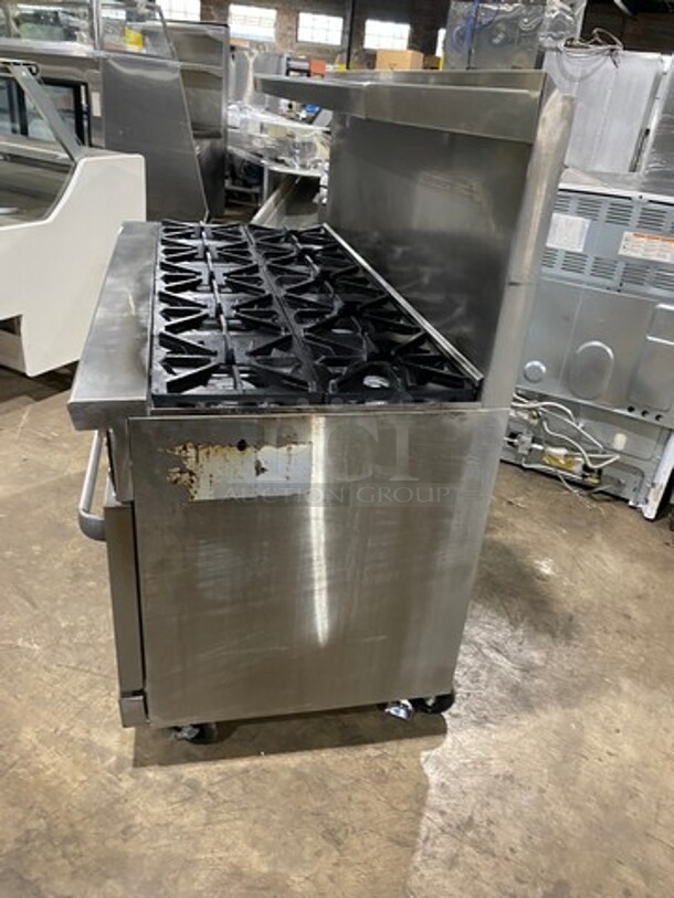 Commercial Natural Gas Powered 10 Burner Stove! With Raised Back Splash And Salamander Shelf! With 2  Oven Underneath! All Stainless Steel! On Casters! - Image 2 of 9