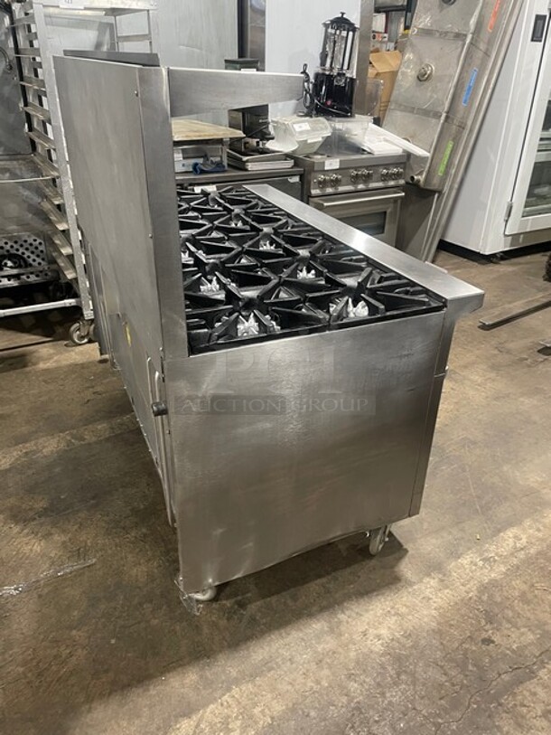 AMAZING! Garland Natural Gas Powered 10 Burner Stove! With 2 Standard Ovens Underneath! With Back Splash & Overhead Salamander Shelf! All Stainless Steel! On Casters! Model: G60-10RR! - Image 3 of 10