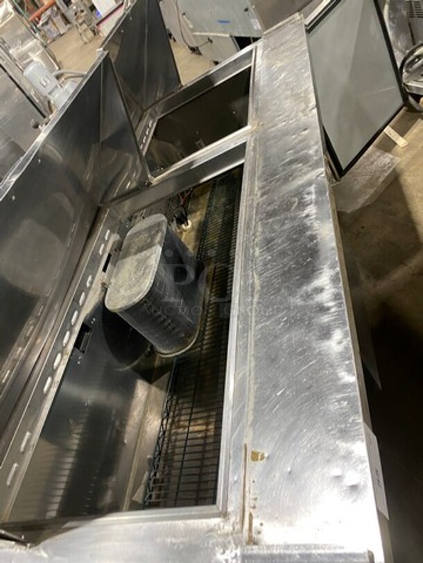 Turbo Air Commercial Refrigerated Mega Top Sandwich Prep Table! With 3 Door Storage Space Underneath! Poly Coated Racks! All Stainless Steel! On Casters! Model: MST7230 115V 60HZ 1 Phase - Image 7 of 9