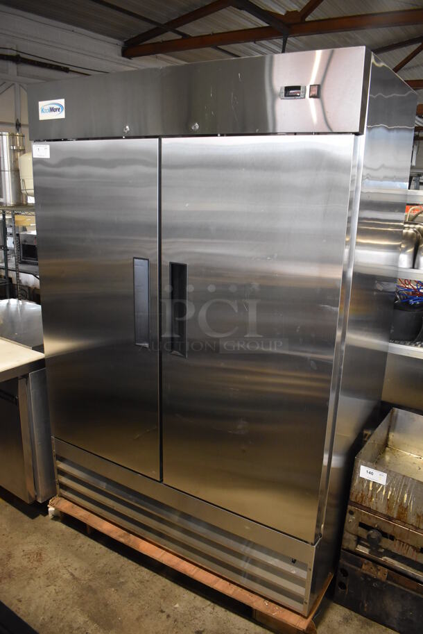 BRAND NEW SCRATCH AND DENT! KoolMore RIR-2D-SS Stainless Steel Commercial 2 Door Reach In Cooler w/ Poly Coated Racks. 115 Volts, 1 Phase.  54x32.5x77.5. Tested and Working! - Image 1 of 6
