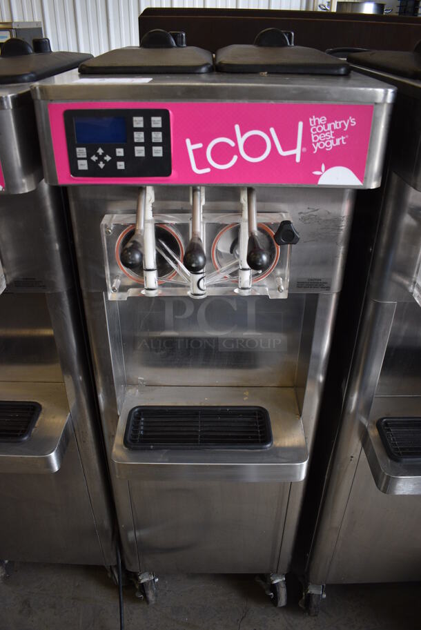 2013 Stoelting Model F231-309I2-AD1 Stainless Steel Commercial Floor Style Air Cooled 2 Flavor w/ Twist Soft Serve Ice Cream Machine on Commercial Casters. 208-240 Volts, 3 Phase.  - Image 1 of 7