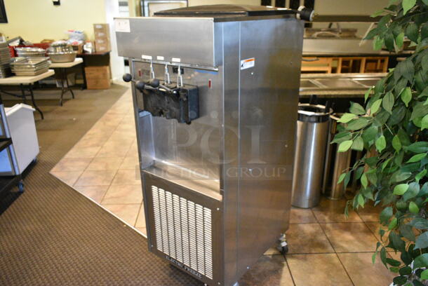 Electro Freeze SL500-132 Stainless Steel Commercial Floor Style Water Cooled 2 Flavor w/ Twist Soft Serve Ice Cream Machine on Commercial Casters. 208-230 Volts, 3 Phase. This Unit Was In Working Condition When the Restaurant Closed. (main dining room) - Image 9 of 10