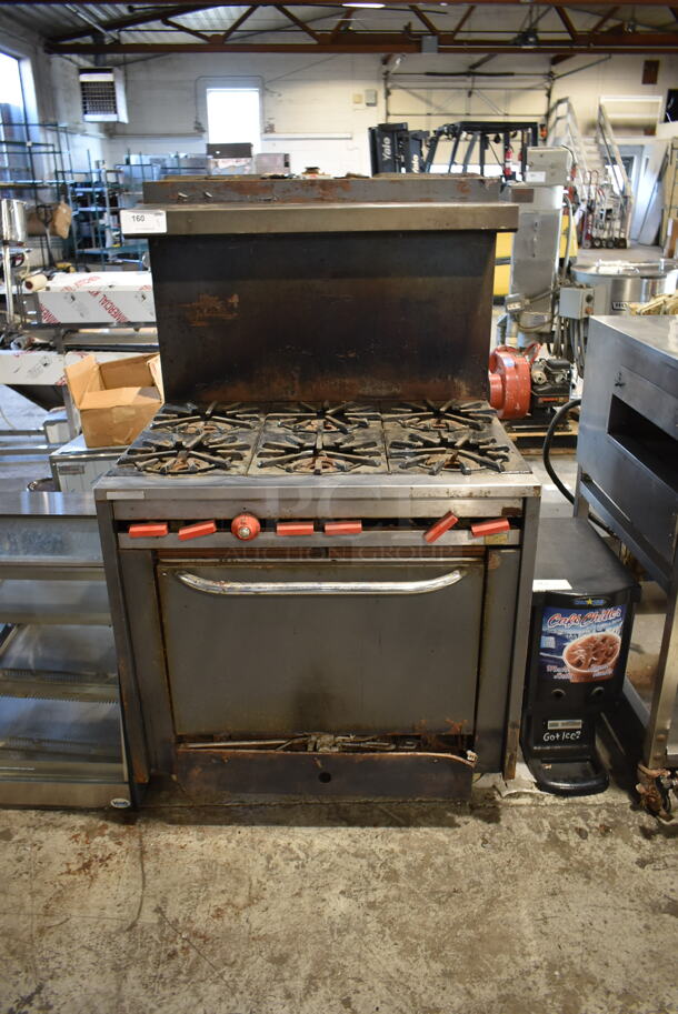 Vulcan Hart 36L70 Metal Commercial Floor Style Propane Gas Powered 6 Burner Range w/ Oven, Over Shelf and Back Splash. 