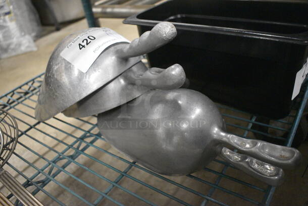 4 Various Metal Ice Scoopers. Includes 16x6.5x3.5. 4 Times Your Bid! - Image 1 of 3