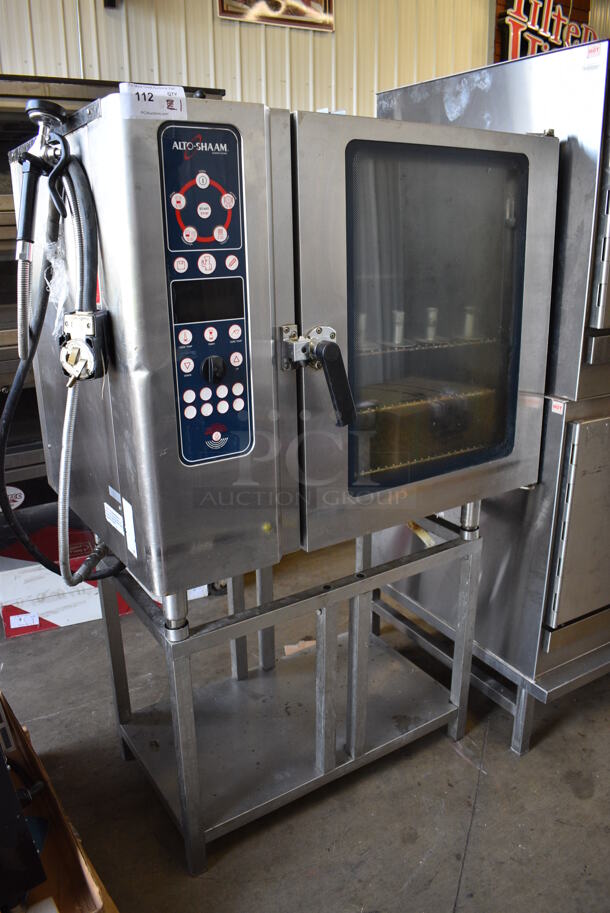 Alto Shaam Model 10.10 MI Stainless Steel Commercial Electric Powered Combitherm Convection Oven w/ View Through Door and Metal Oven Racks on Metal Stand. 208-240 Volts, 3 Phase. 40x30x66 - Image 1 of 8