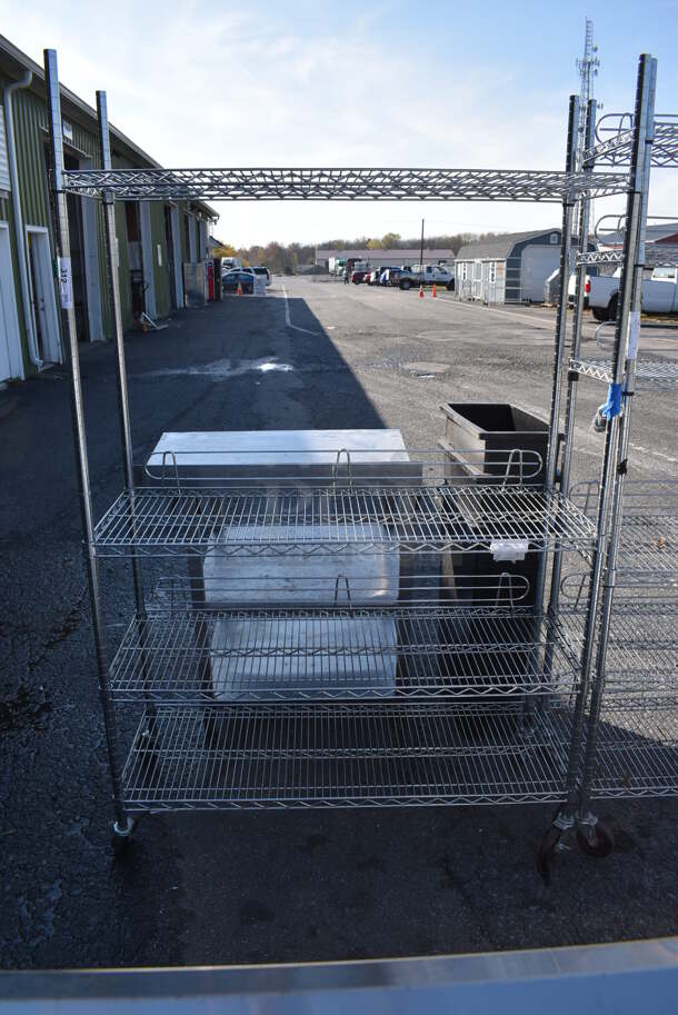 Chrome Finish 4 Tier Wire Shelving Unit on Commercial Casters. BUYER MUST DISMANTLE. PCI CANNOT DISMANTLE FOR SHIPPING. PLEASE CONSIDER FREIGHT CHARGES. 48x19x76.5