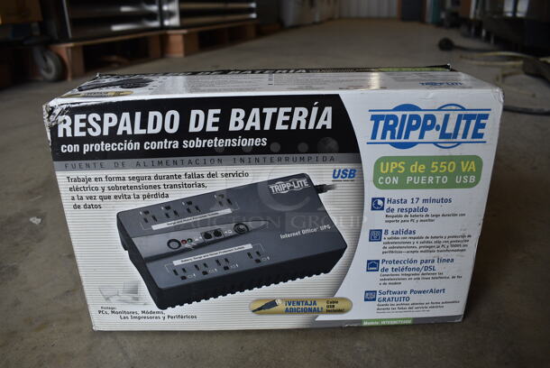 BRAND NEW IN BOX! Tripp Lite Uninterruptible Power Supply. 10.5x5.5x3 - Image 1 of 3
