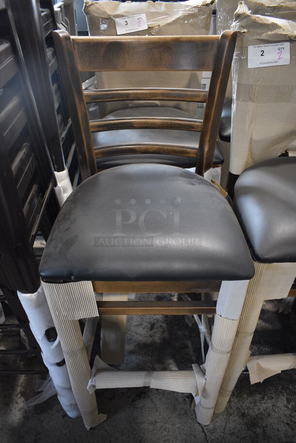 4 BRAND NEW SCRATCH AND DENT! Lancaster Table & Seating Wooden Bar Height Chair with Vintage Ladder Back and Black Padded Seat. 17x17x44. 4 Times Your Bid!