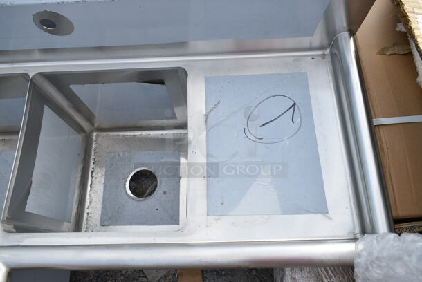 BRAND NEW SCRATCH AND DENT! Regency 600S3141414C Stainless Steel 44 1/2" 16 Gauge Stainless Steel Three Compartment Commercial Corner Sink with Two Drainboards - 14" x 14" x 14" Bowls. No Legs.  - Image 4 of 8