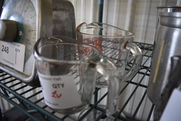 2 Glass Measuring Cups. 5x3.5x4, 6x4.5x4.5. 2 Times Your Bid! - Image 3 of 3