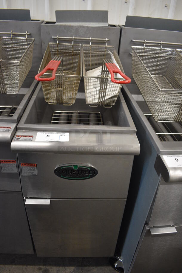 2021 Mainstreet Model FF400-P Stainless Steel Commercial Floor Style Propane Gas Powered 40 Pound Capacity Deep Fat Fryer w/ 2 Metal Fry Baskets. 120,000 BTU. 15.5x30x47