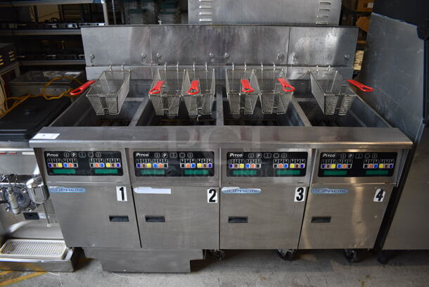 2014 Pitco Frialator Model SSH60 ENERGY STAR Stainless Steel Commercial 4 Bay Natural Gas Powered Deep Fat Fryer w/ 6 Metal Fry Baskets and Filtration System on Commercial Casters. 80,000 BTU. 62.5x35x49 - Image 1 of 11