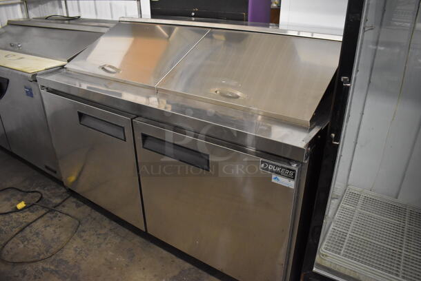 Dukers DSP60 Stainless Steel Commercial Sandwich Salad Prep Table Bain Marie Mega Top on Commercial Casters. 115 Volts, 1 Phase. 60x32x47. Tested and Powers On But Does Not Get Cold