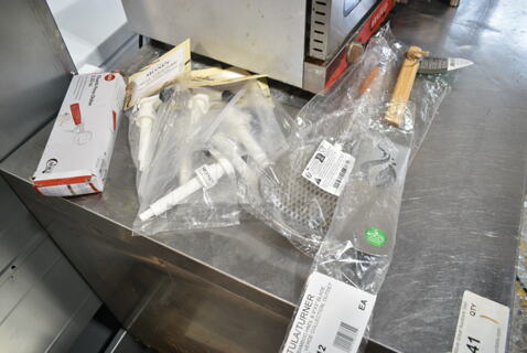 4 BRAND NEW SCRATCH AND DENT! Items Including 407TPD24RD Choice #24 Red Thumb Press Disher - 1.33 oz., 714QV12 Outset® QV12 18" Stainless Steel Ultra-Thin Slotted Turner with Bamboo Handle, Monin Syrup Pumps, Strainer. 4 Times Your Bid! 