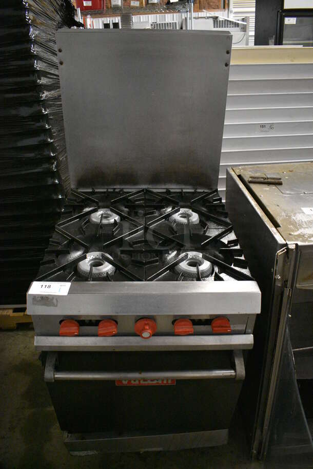 Vulcan Stainless Steel Commercial Natural Gas Powered 4 Burner Range w/ Oven and Back Splash. 24x30x62