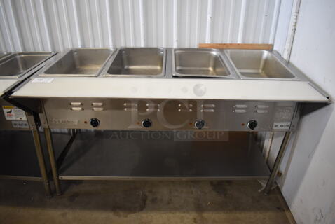 ServIt 423EST4WE750 Stainless Steel Commercial Electric Powered 4 Bay Electric Powered Steam Table w/ Cutting Board and Under Shelf. 208/240 Volts. 58x30x34
