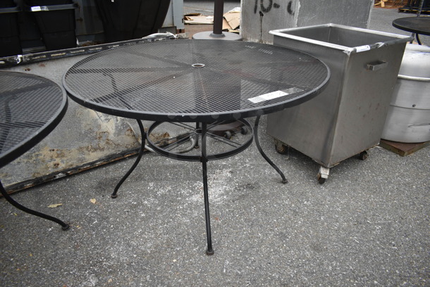 Black Metal Mesh Round Patio Table. - Image 1 of 3