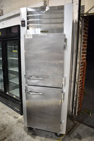 Traulsen G10000 Stainless Steel Commercial 2 Half Size Door Reach In Cooler on Commercial Casters. 115 Volts, 1 Phase. Tested and Working!