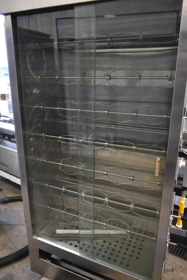 BRAND NEW SCRATCH AND DENT! 2022 Southwood RG7-NAT Stainless Steel Commercial Natural Gas Powered 7 Spit Rotisserie Oven.  - Image 2 of 9