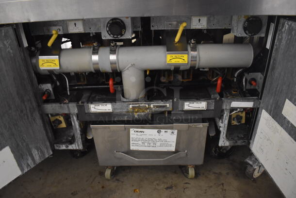 2011 Dean SCFSM350GNS Stainless Steel Commercial Floor Style Natural Gas Powered 3 Bay Deep Fat Fryer w/ 6 Metal Fry Baskets and Filtration System on Commercial Casters. 105,600 BTU. 47x30x51 - Image 7 of 11