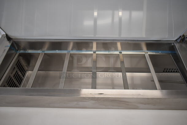 BRAND NEW SCRATCH AND DENT! 2023 Avantco 178SSPPT3 Stainless Steel Commercial Pizza Prep Table on Commercial Casters. 115 Volts, 1 Phase. Tested and Working! - Image 5 of 11