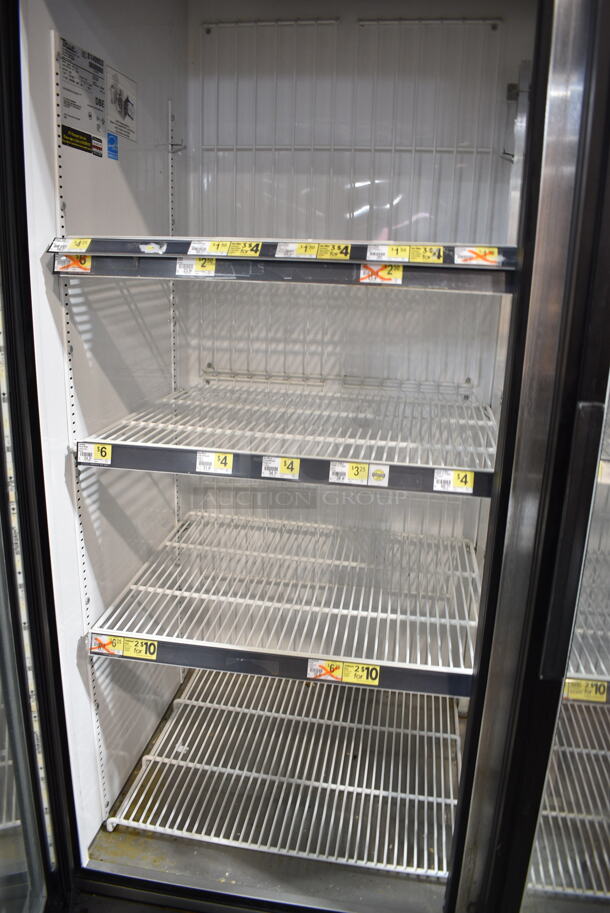 2015 True GDM-72F-LD ENERGY STAR Metal Commercial 3 Door Reach In Freezer Merchandiser w/ Poly Coated Racks on Commercial Casters. 115/208-240 Volts, 1 Phase. Tested and Working! - Image 6 of 7