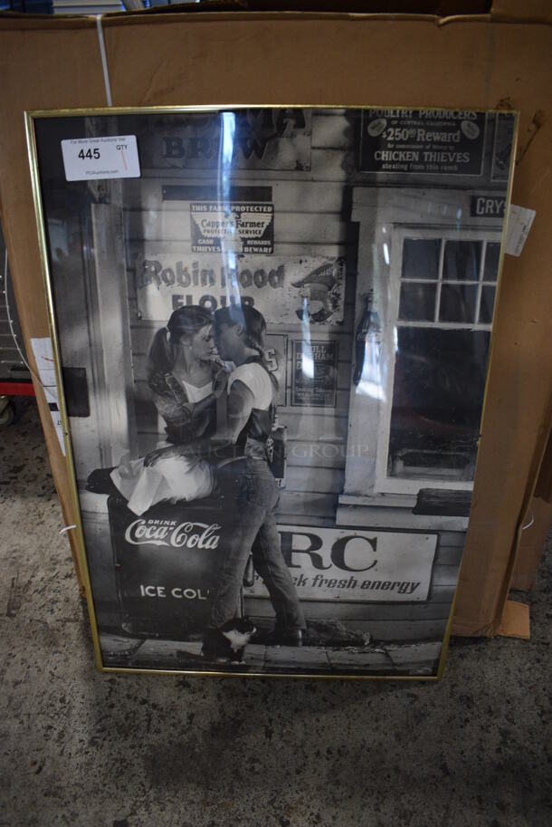 Framed Coca Cola Poster. 24.5x1x36.5