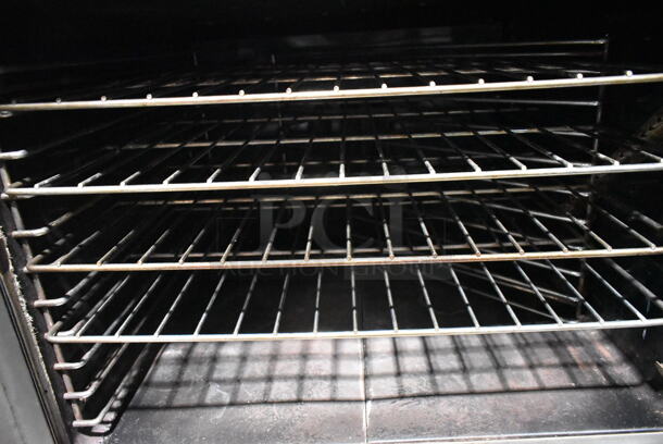 2 Garland SunFire Stainless Steel Commercial Natural Gas Powered Full Size Convection Ovens w/ View Through Doors, Metal Oven Racks and Thermostatic Controls on Commercial Casters. 2 Times Your Bid! - Image 6 of 11