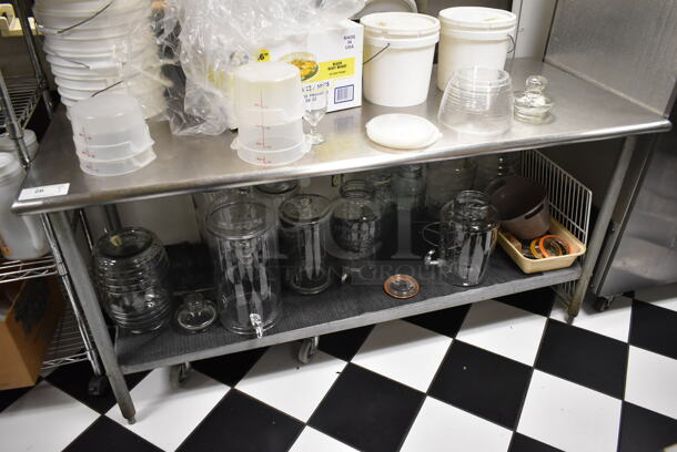Stainless Steel Commercial Table w/ Under Shelf. Does Not Include Contents. BUYER MUST REMOVE. (ice room)