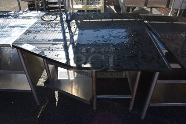 Stainless Steel Commercial Table w/ Black Countertop and Under Shelves. 39x37x35