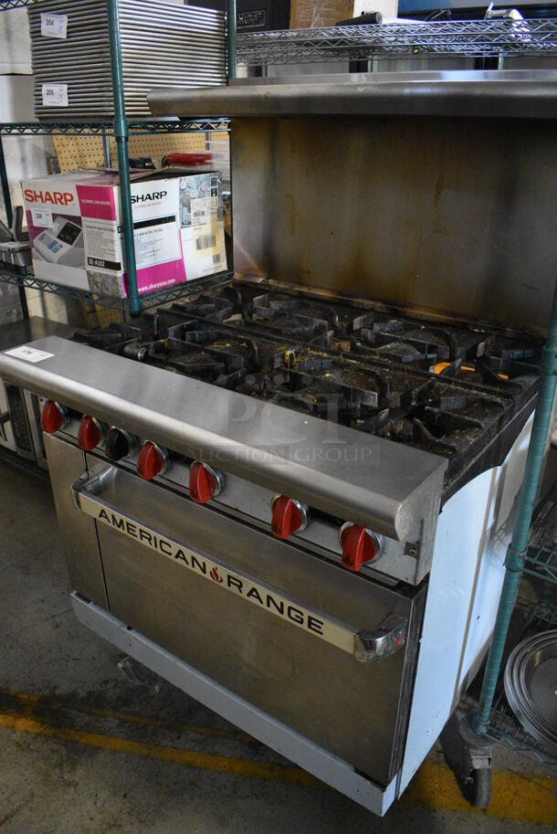 LATE MODEL! American Range Stainless Steel Commercial Natural Gas Powered 6 Burner Range w/ Oven, Over Shelf and Back Splash. 36x32.5x56