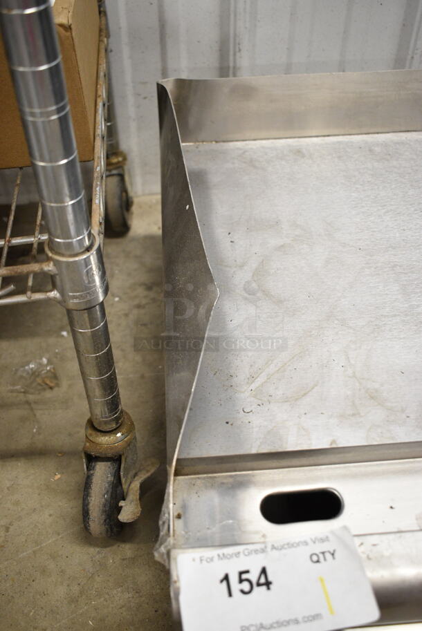 BRAND NEW SCRATCH AND DENT! Avantco 177EG24N Stainless Steel Commercial Countertop Electric Powered Flat Top Griddle. 208/240 Volts, 1 Phase. - Image 4 of 6