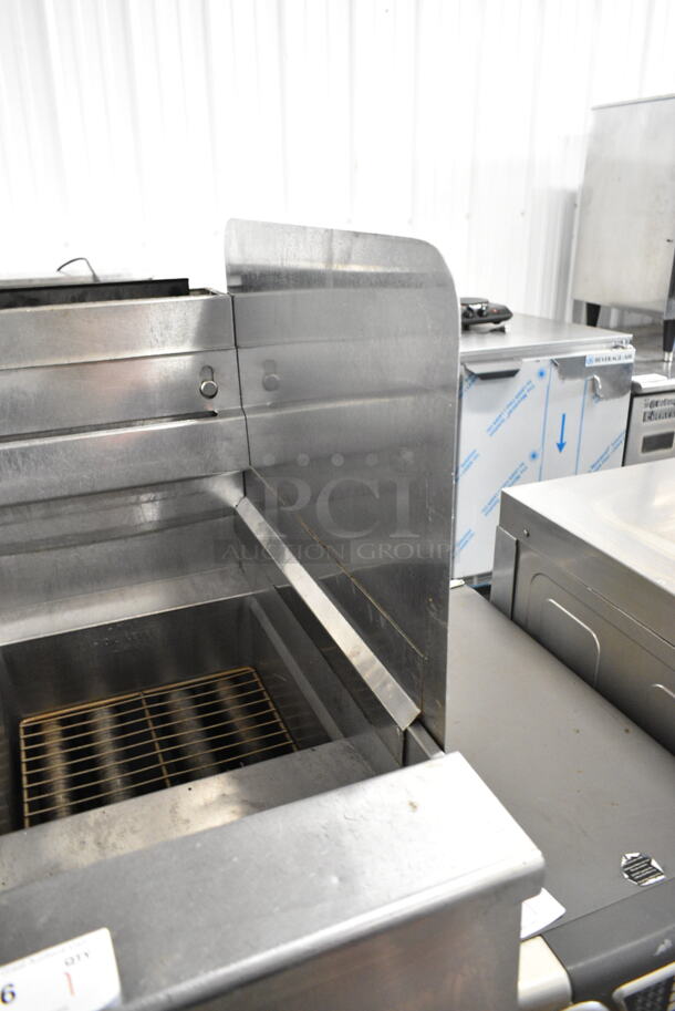 2015 Pitco Frialator SG14 Stainless Steel Commercial Floor Style Natural Gas Powered Deep Fat Fryer on Commercial Casters.  - Image 3 of 7