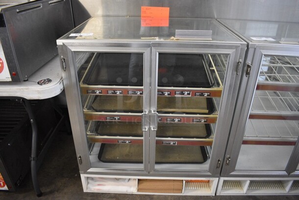 Glass Commercial Countertop Donut Display Case w/ Poly Coated Racks and Black Poly Trays. 31x25x36.