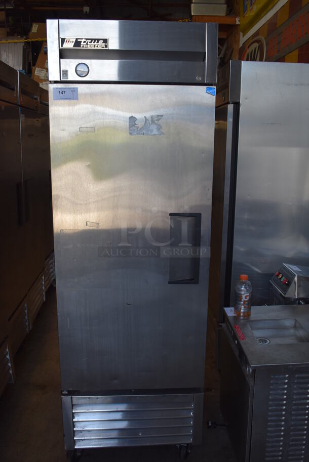 2013 True T-23F ENERGY STAR Stainless Steel Commercial Single Door Reach In Freezer w/ Poly Coated Rack on Commercial Casters. 115 Volts, 1 Phase. Tested and Powers On But Does Not Get Cold